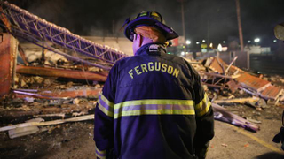 Illustration for article titled Ferguson Burning: 61 Arrested, 10 Businesses Destroyed, 150 Shots Fired